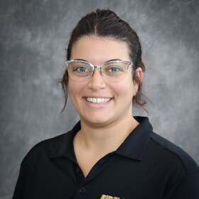 Staff member Lizzie Davis from ddd4f97a7fcb