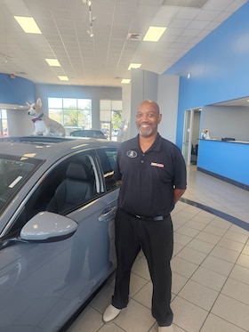 Staff member Mike Simmons from fa5470f83305