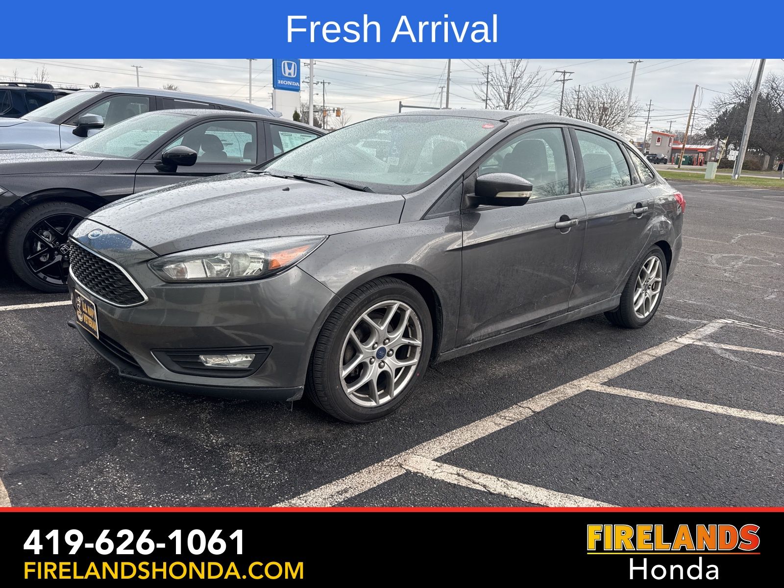 Used 2015 Ford Focus SE with VIN 1FADP3F28FL239297 for sale in Sandusky, OH
