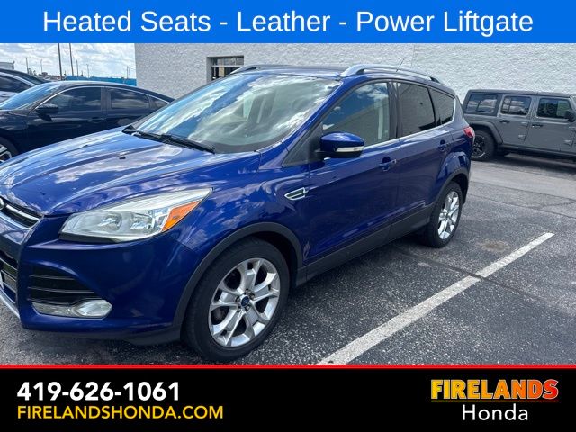 Used 2016 Ford Escape Titanium with VIN 1FMCU0JX4GUA64733 for sale in Sandusky, OH