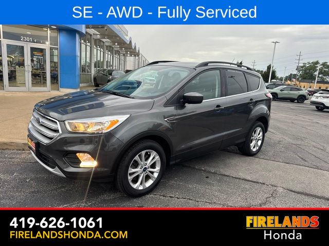 Used 2018 Ford Escape SE with VIN 1FMCU9GD4JUA81086 for sale in Sandusky, OH
