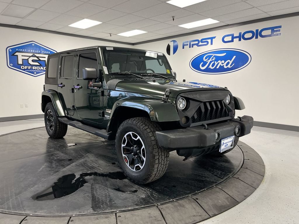Used 2010 Jeep Wrangler Unlimited Sahara with VIN 1J4BA5H1XAL166701 for sale in Rock Springs, WY