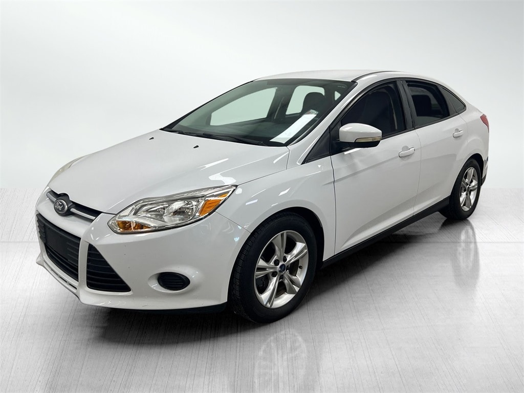 Used 2014 Ford Focus SE with VIN 1FADP3F21EL238412 for sale in Clearwater, FL