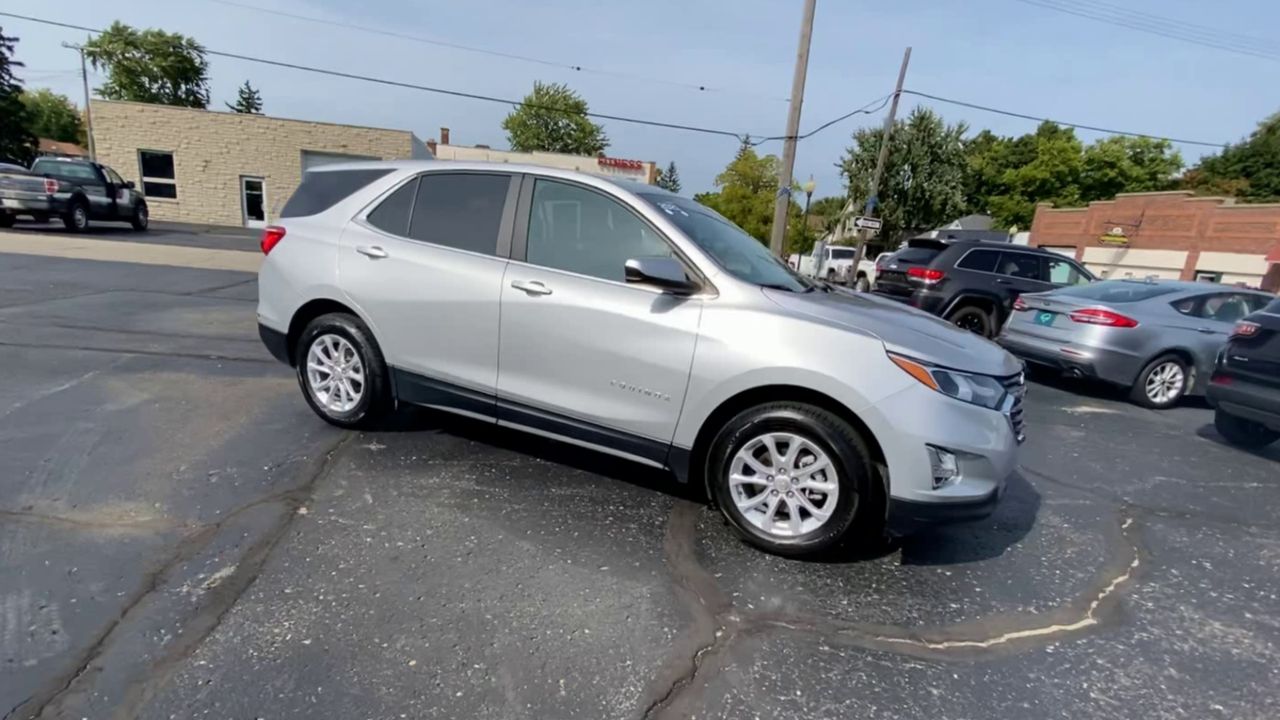 Used 2021 Chevrolet Equinox LT with VIN 3GNAXUEV2MS151035 for sale in Bad Axe, MI