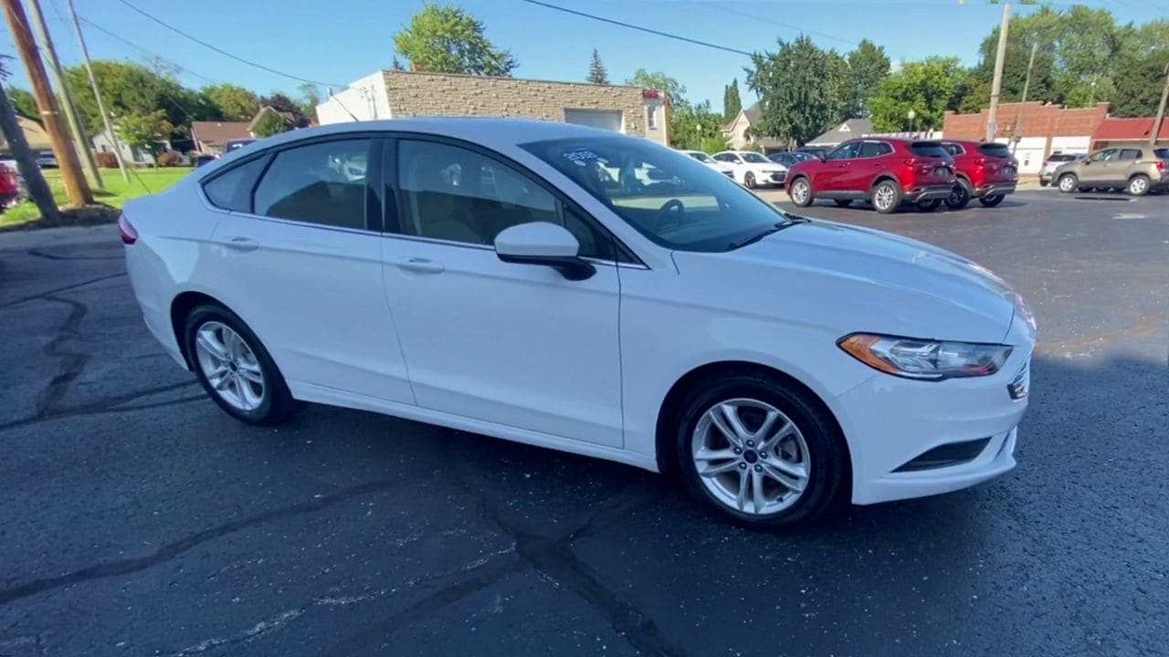 Used 2018 Ford Fusion SE with VIN 3FA6P0H77JR198252 for sale in Bad Axe, MI