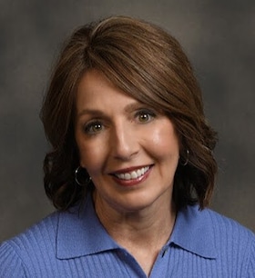Staff member Carolyn Flannery from ID_669103