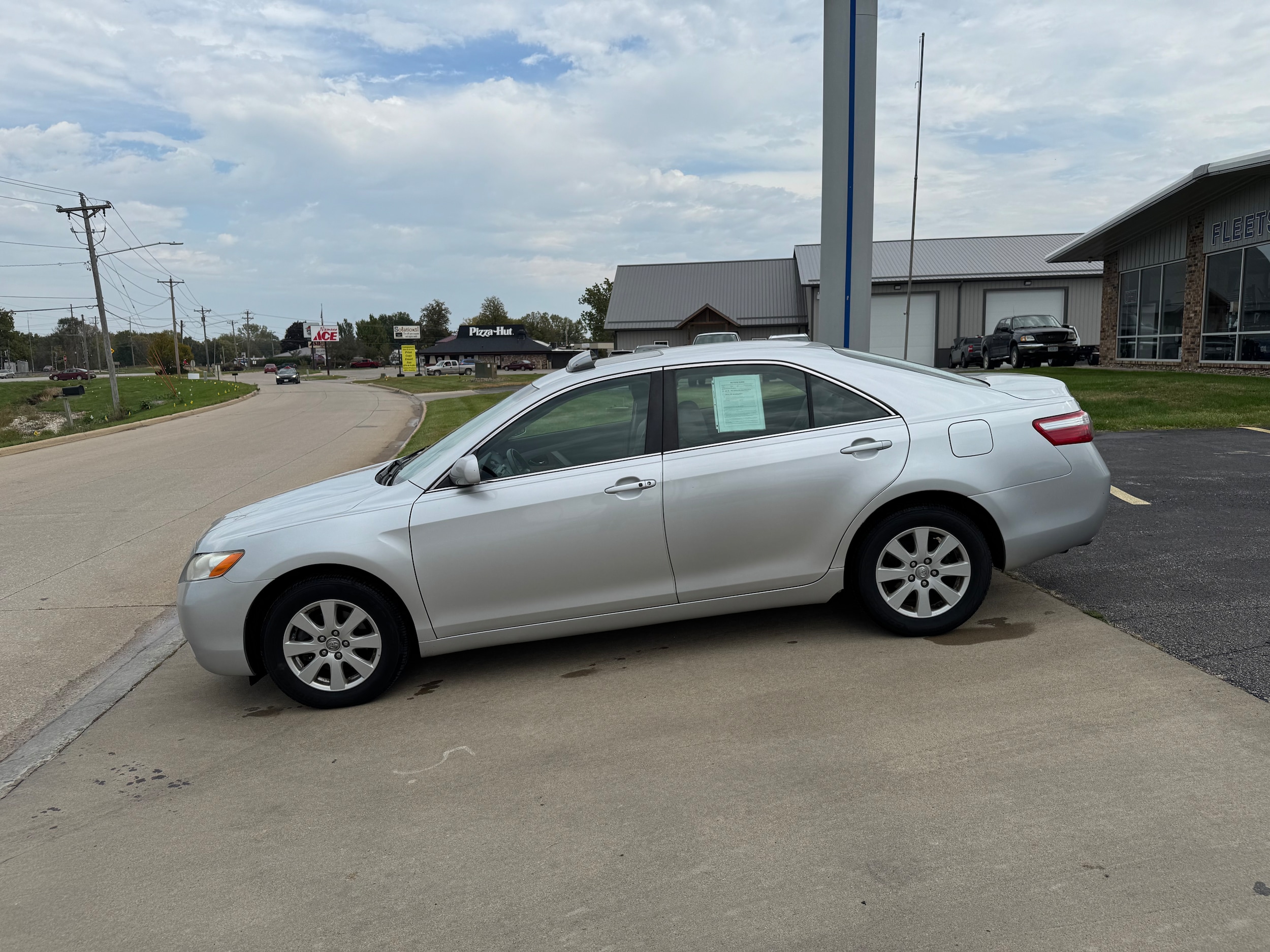 Used 2007 Toyota Camry XLE with VIN 4T1BK46K87U555585 for sale in Osceola, IA