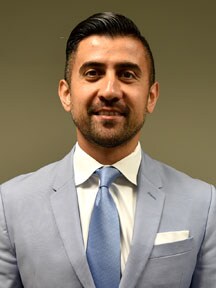 Staff member Sean Zalmai from ID_38446247814a