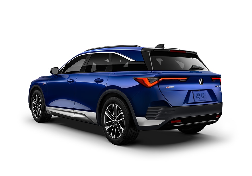 Rear exterior view of a new Acura ZDX SUV. The car is dark blue in front of a white background
