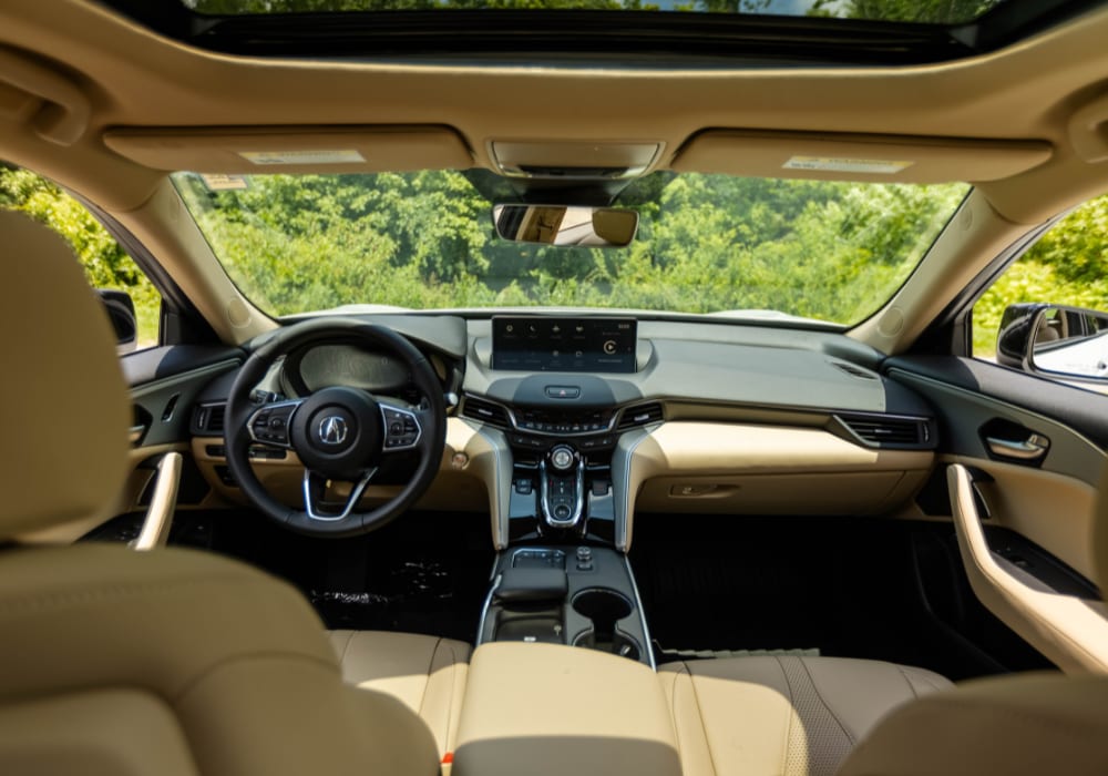 Image of the inside of a 2025 Acura Integra with tan interior