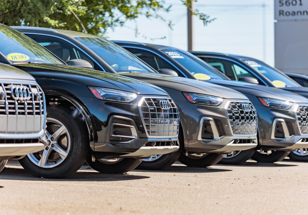 Lineup of Audi cars for sale in the parking lot of Audi Greensboro