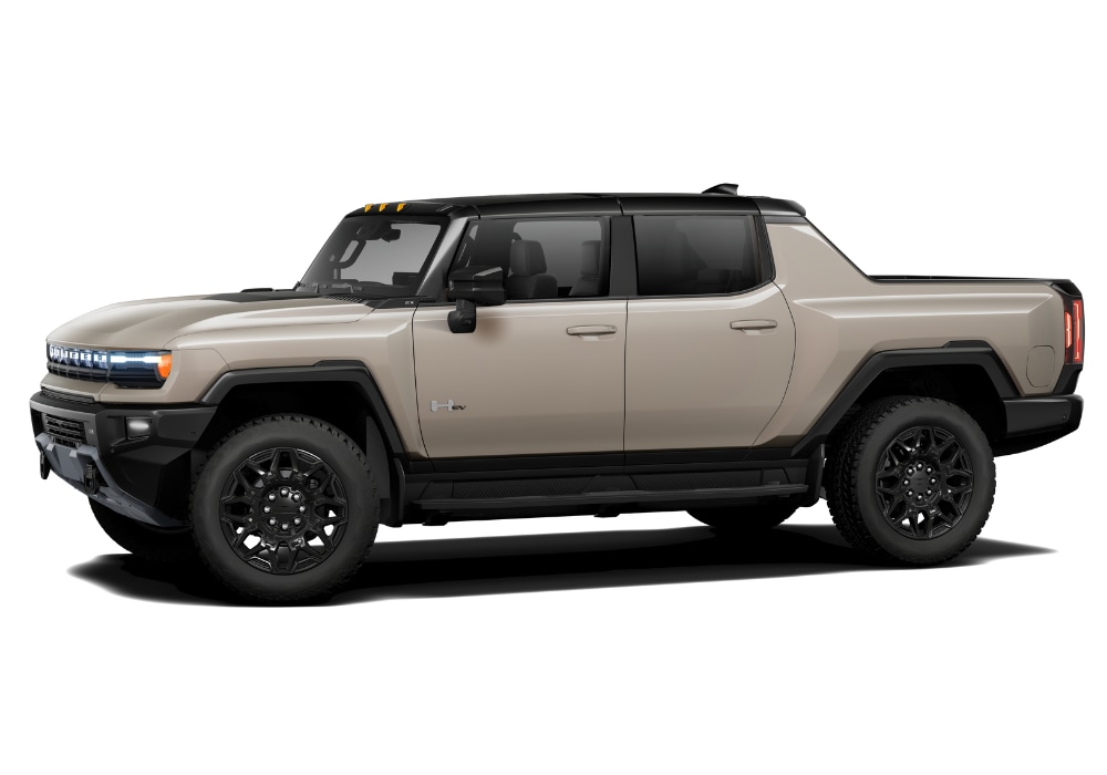 Driver's side view of a new GMC Hummer EV pickup truck in front of a white background
