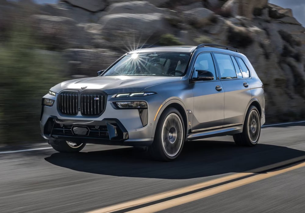 new-bmw-x7-for-sale New BMW X7 driving down a road