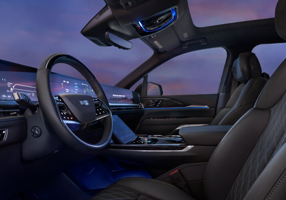 2025 Cadillac Escalade interior, including the steering wheel and infotainment system