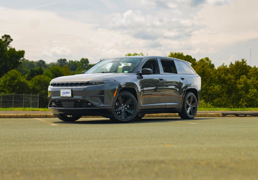 2025 Jeep Wagoneer S parked on a paved surface with trees in the background
