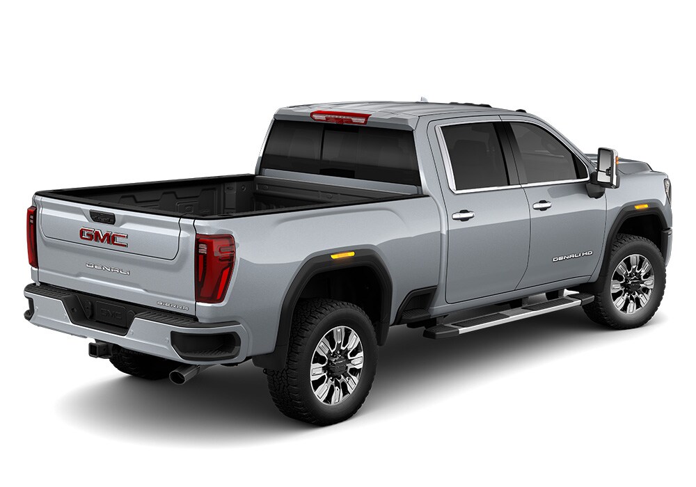 gmc-sierra-3500-pickup-truck-greensboro.jpg Rear 3/4 view of the 2025 GMC Sierra truck. The GMC logo is visible on the truck's tailgate