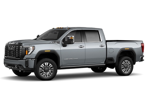 sierra-3500-for-sale.jpg Exterior view of a 2025 GMC Sierra 3500 HD for sale. The truck is gray and the photo background is white