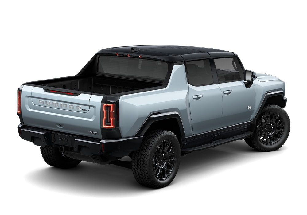 gmc-hummer-ev-pickup-for-sale.jpg Rear view of a new GMC Hummer EV Pickup truck. The Hummer logo is visible on the tailgate