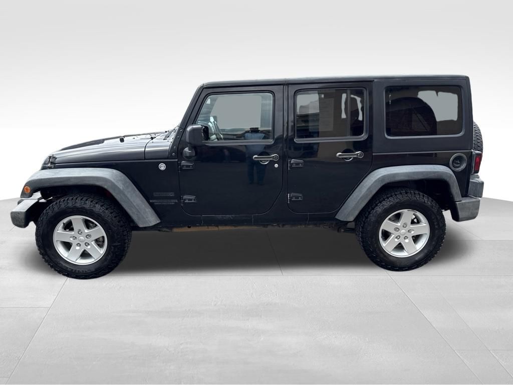 Used 2015 Jeep Wrangler Unlimited Sport with VIN 1C4HJWDG1FL618834 for sale in Montrose, CO