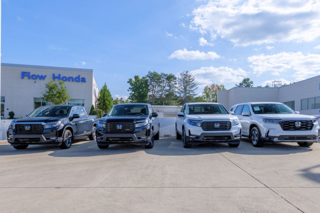 Row of used Hondas for sale outside at Flow Honda dealership in Winston-Salem