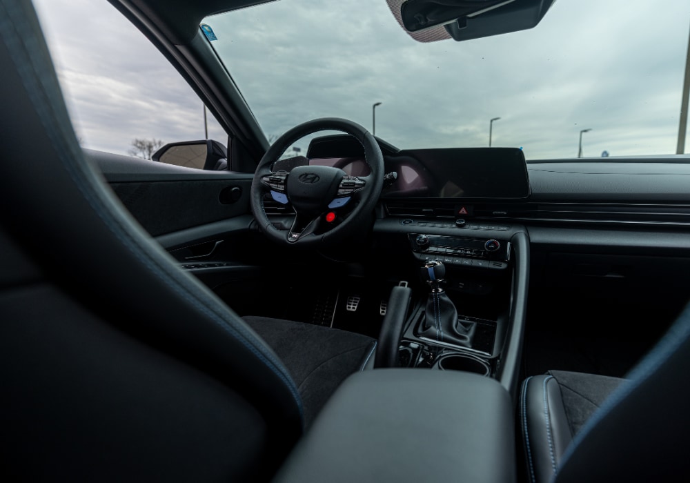2026 Hyundai Elantra interior featuring the steering wheel and touch screen infotainment system