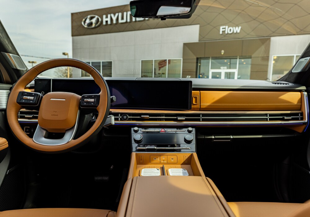 2026 Hyundai Santa Fe Hybrid interior, showing the front dash including the infotainment system and steering wheel