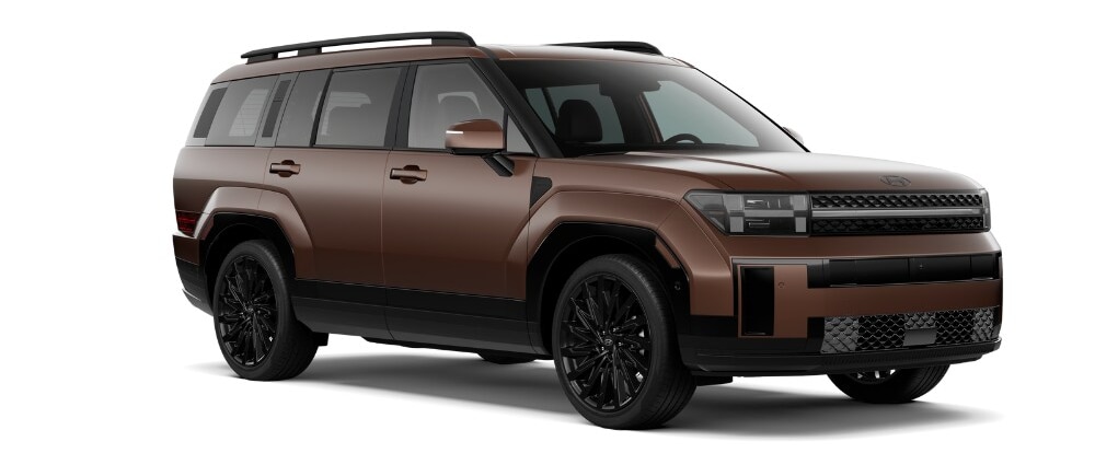 2025-hyundai-santa-fe-for-sale-1000x414.png Brown Hyundai Santa Fe in front of a white background