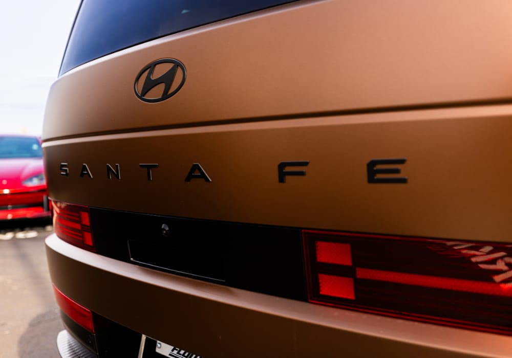 Close up photo of the back of a 2026 Hyundai Santa Fe Hybrid for sale