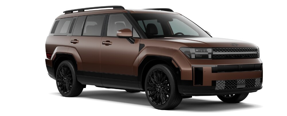 2025-hyundai-santa-fe-for-sale-1000x405.png Brown Hyundai Santa Fe in front of a white background