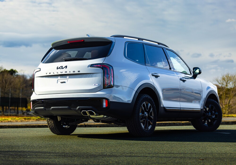Rear exterior view of the Kia Telluride for sale. The SUV is white