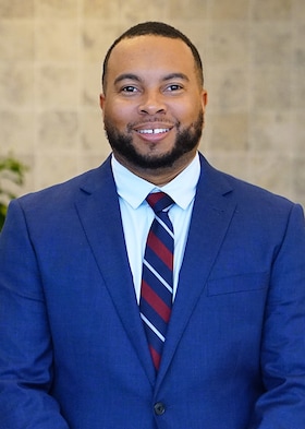 Staff member TREVOR BAYNES from ID_c6d6883397cf