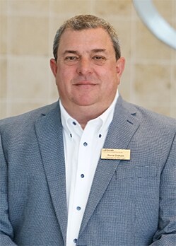 Staff member DAVID OLDHAM from ID_8d43f3349c6a