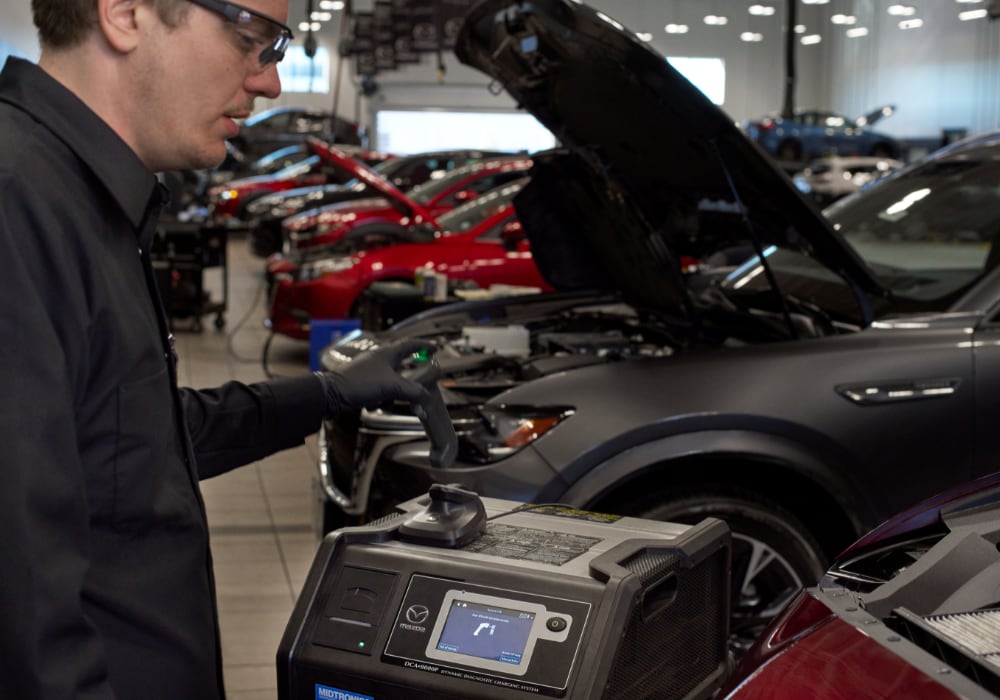 service technician working on a new mazda CX-5