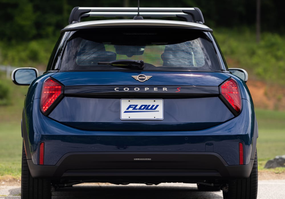 Back of a 2026 Mini Cooper for sale. The car is dark blue