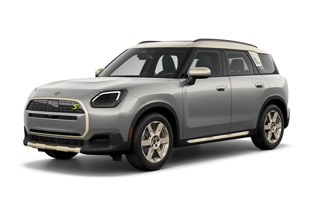 electric-mini-cooper-countryman.jpg Front exterior view of a 2025 MINi Countryman SE All4. The car is gray and the background is white