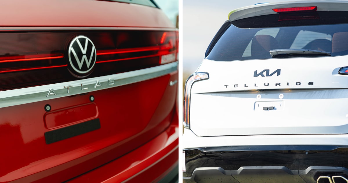 Close up of the back of a VW Atlas next to a Kia Telluride