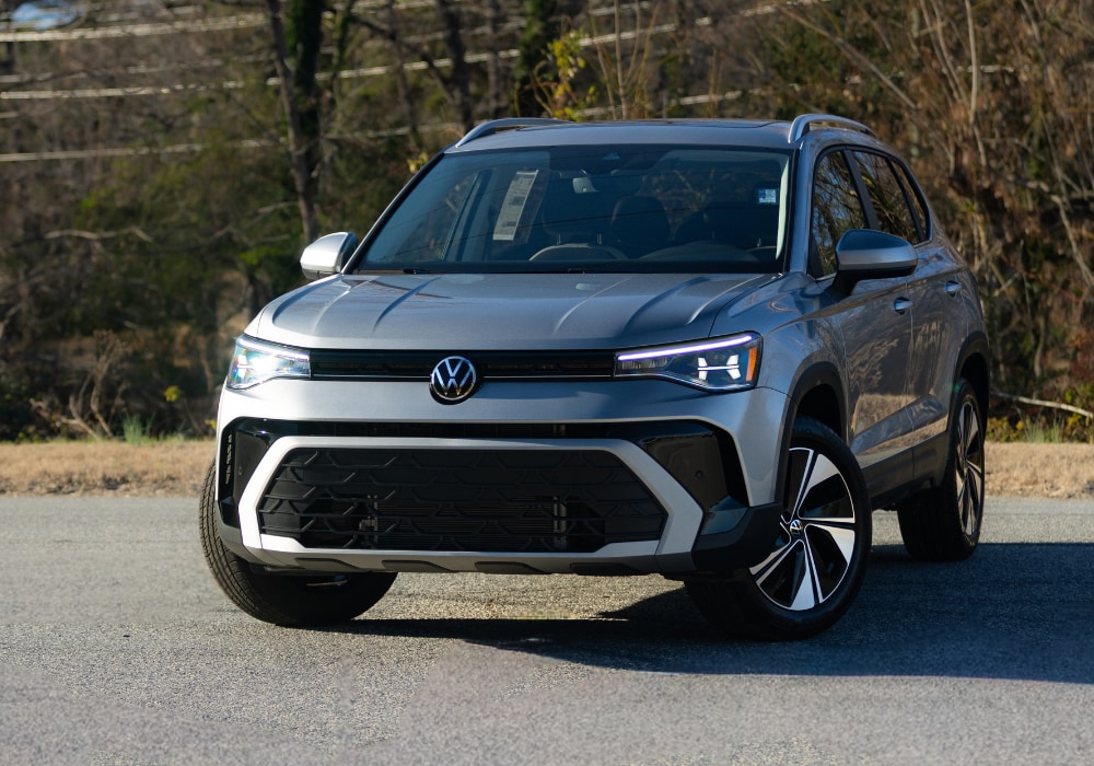 Silver 2026 Volkswagen Tiguan SUV parked outside on a paved area