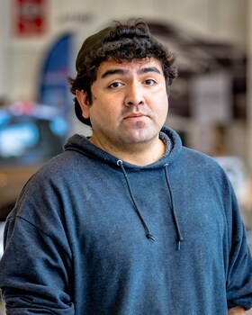 Staff member Calos Ortiz from 8eb82a89a6da