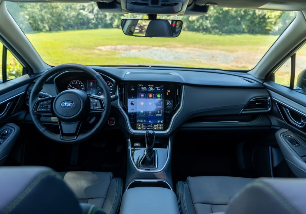 2025 Subaru Outback interior view. The photo shows the entire front dash, including the steering wheel and infotainment system