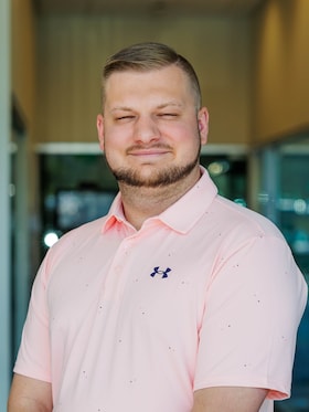 Staff member Travis Collier from bb8b7cc971a5