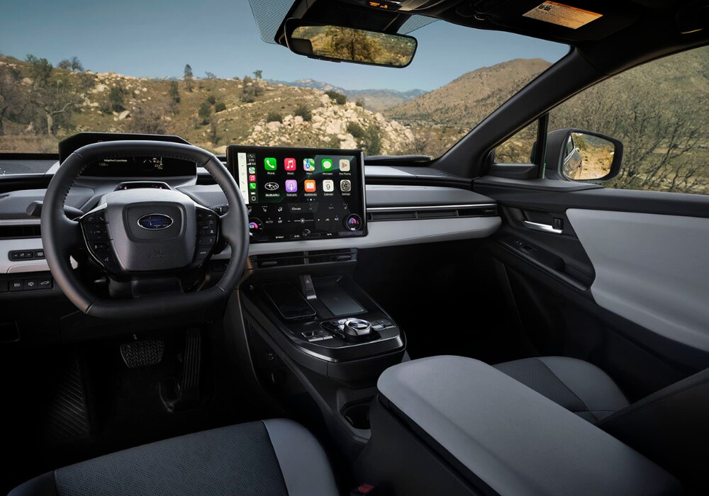 2026 Subaru Trailseeker interior, showing the entire front dash inside the vehicle. Apply Carplay is pulled up on the infotainment screen