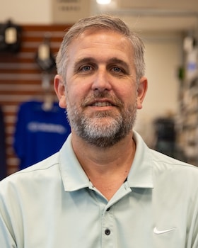 Staff member Andrew Ange from f47ea2b53bd3