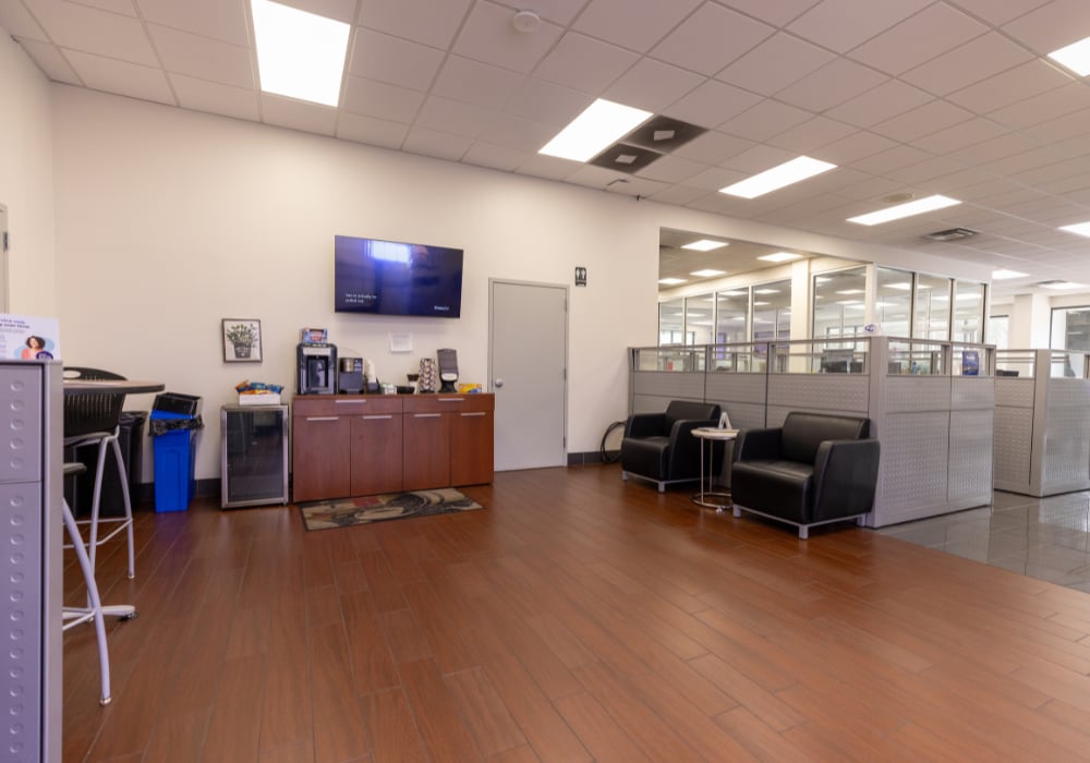 waiting room at flow subaru in winston salem with complimentary wifi and snacks