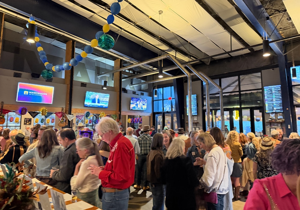 event participants having food and drinks while listening to music