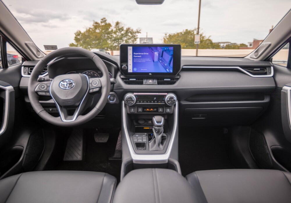 Interior of the new Toyota RAV4, including the steering wheel and touch screen infotainment system