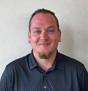 Staff member Justin Sisney from ID_f95cd90c7bb0