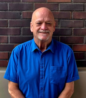 Staff member RC O'Neill from ID_a4b415d5e880