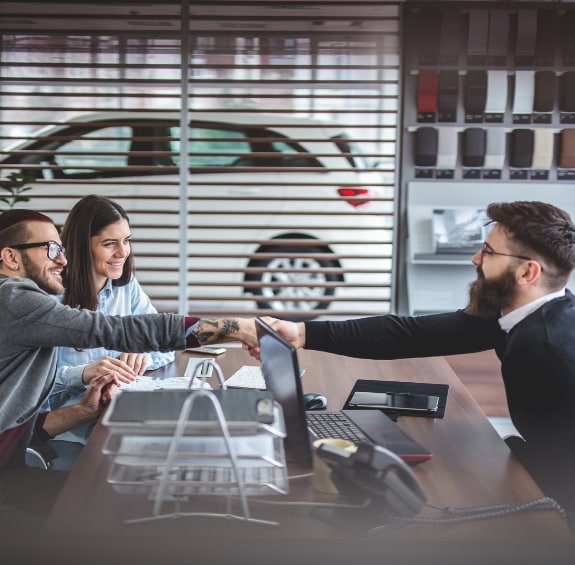 customer receiving car keys at Ford Albany dealership
