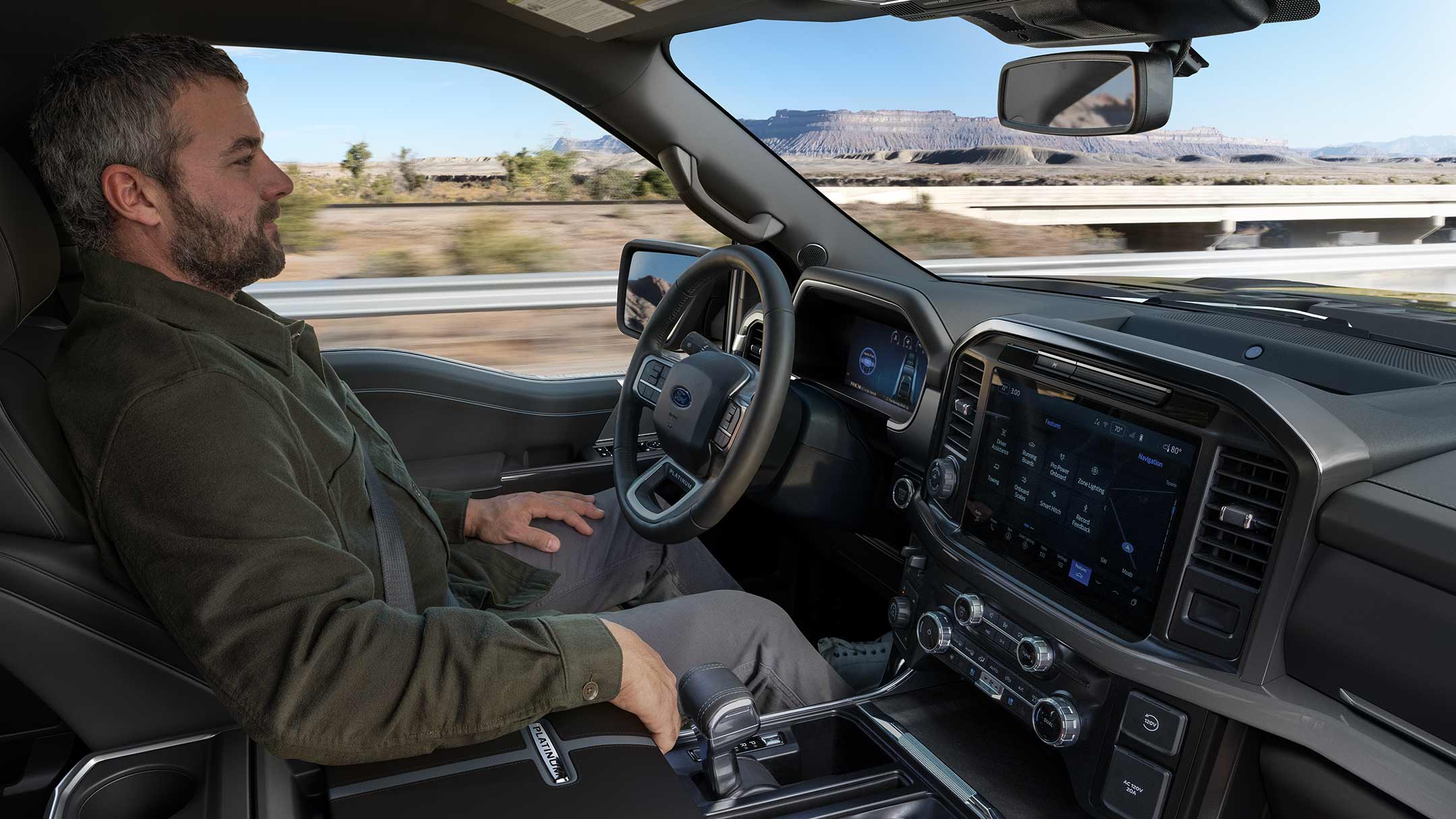 Man using the Ford BlueCruise hands-free driving feature on a 2025 Ford F-150® pickup