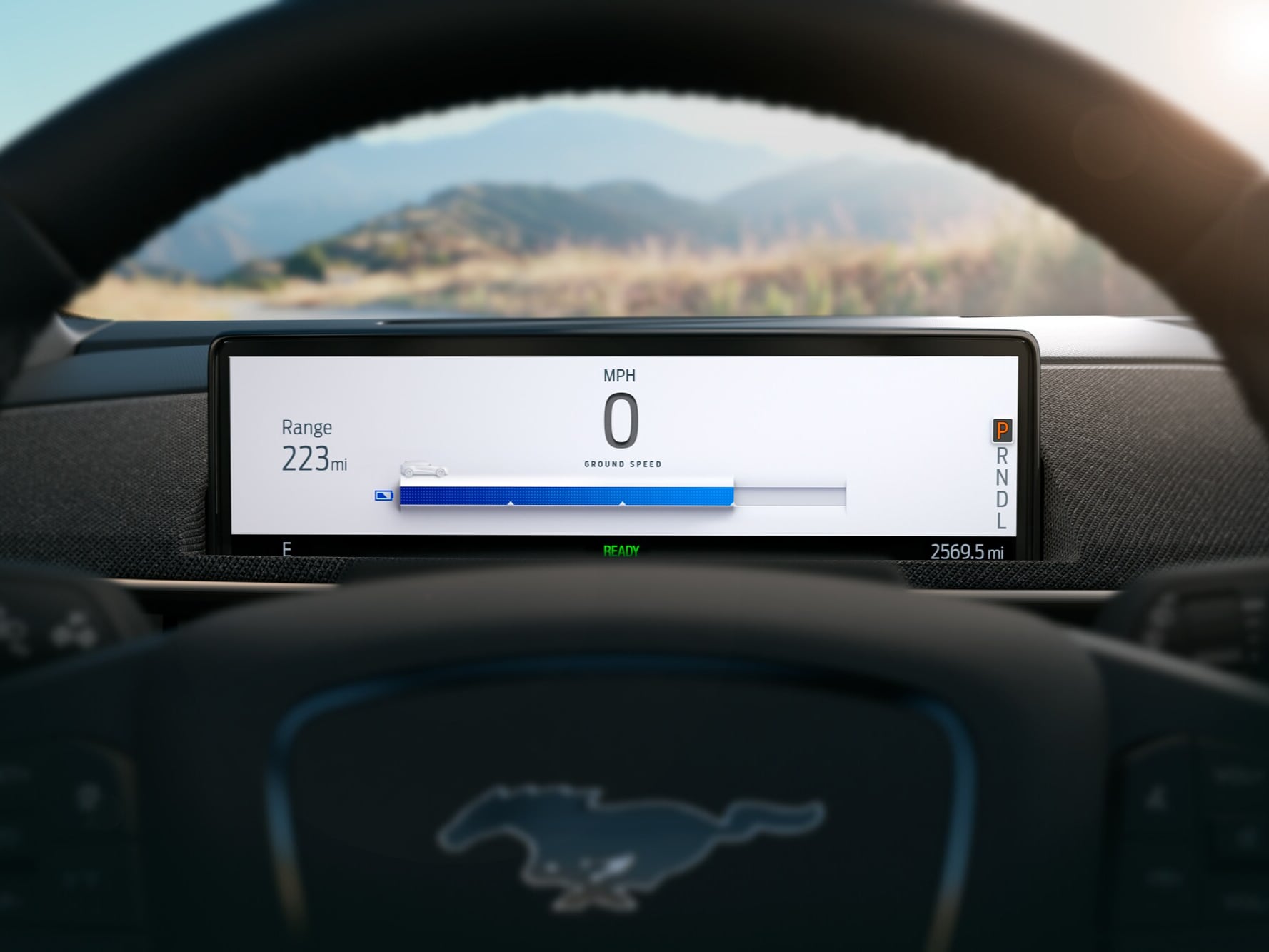 223 miles of available range being displayed on a Ford Mustang Mach-E® dashboard screen